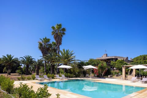 Seasonal outdoor pool, pool umbrellas, sun loungers