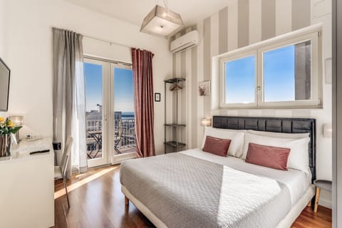 Deluxe Double Room, Balcony, Sea View | Premium bedding, down comforters, minibar, in-room safe