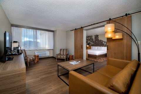 Suite, 1 Bedroom, Mountain View (Tower 1) | Desk, blackout drapes, iron/ironing board, free cribs/infant beds