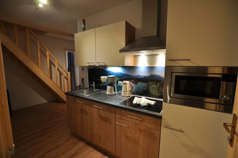 Appartement Faakersee | Private kitchen | Full-size fridge, stovetop, dishwasher, coffee/tea maker