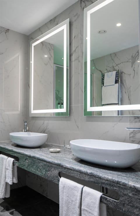 Shower, eco-friendly toiletries, hair dryer, bidet