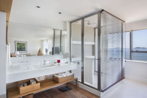 Designer toiletries, hair dryer, bathrobes, slippers