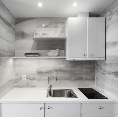 Family Suite | Private kitchen | Full-size fridge, espresso maker, electric kettle