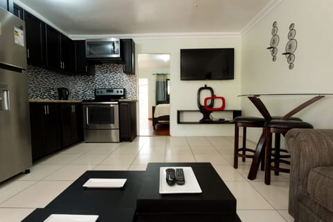 50-inch flat-screen TV with cable channels, TV, DVD player