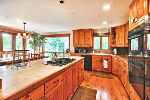 Discover your inner gourmet chef in the spacious kitchen with its large island