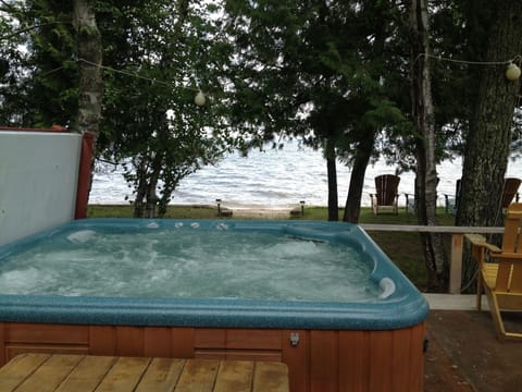 NEW FEATURE: Enjoy a hot tub that is built in to the deck with a view of Big Bay