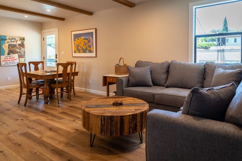 Gather at the table beside the relaxed seating