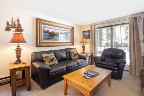 Sink into plush leather seating where rustic charm meets comfort, your perfect retreat after mountain adventures.