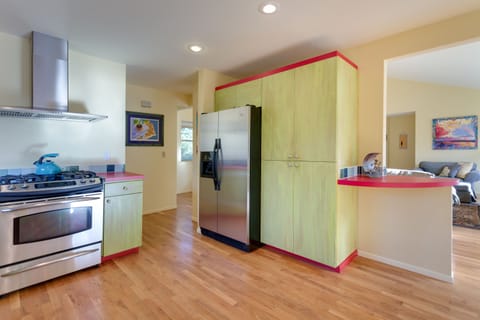 Gas range and double wide stainless fridge