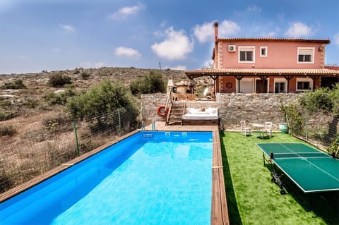 Private pool and enclosed garden with table tennis.