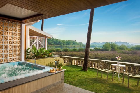 Deluxe Suite, 1 Double Bed, River View (Cozy Sitout, Private Veranda) | Egyptian cotton sheets, premium bedding, Select Comfort beds, minibar