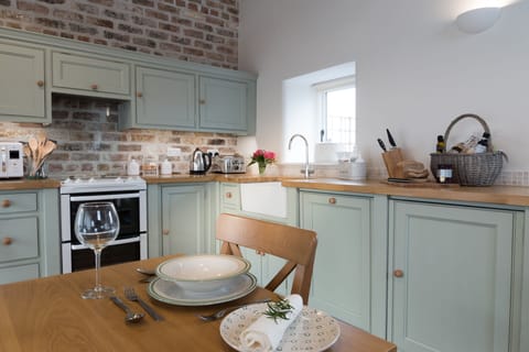 Hand crafted country kitchen, oak wood flooring and underfloor heating.