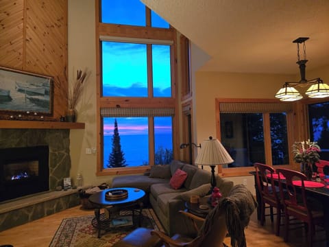 618 Windsong Drive sunrise view.  Our end unit has LOTS of lake facing windows,