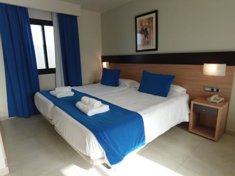 Minibar, desk, blackout drapes, soundproofing