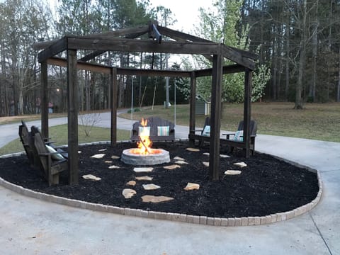 View of the firepit from the front porch.