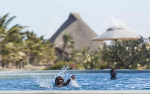 4 outdoor pools, open 6:00 AM to 6:00 PM, free cabanas, pool umbrellas