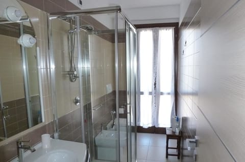 Shower, free toiletries, hair dryer, bathrobes