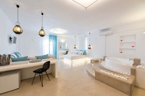 Luxury Suite, Sea View (Indoor Hot Tub) | 1 bedroom, minibar, in-room safe, individually decorated