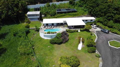Aerial view of the 1- acre gated property.  