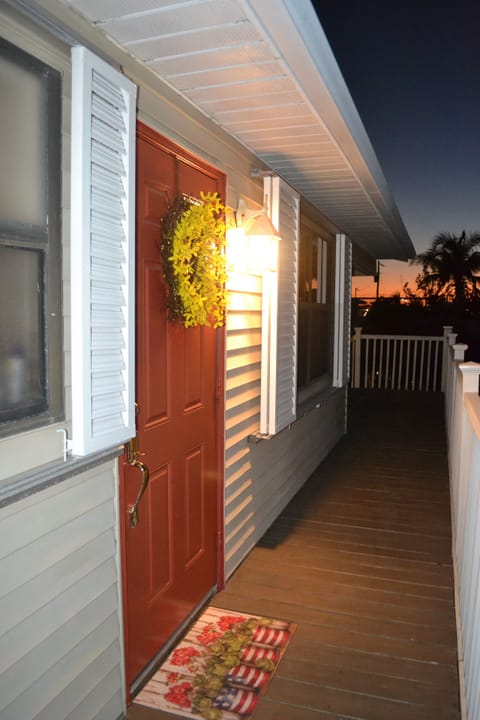 Wrap around deck with two stairs (front and back of house)