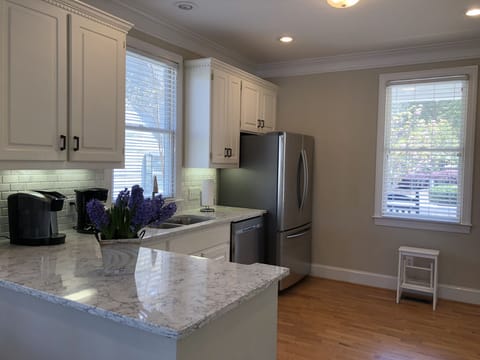 Kitchen renovated with new counters, back splash and appliances.