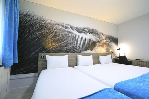 Individually decorated, individually furnished, desk, blackout drapes