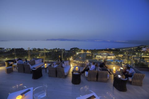 3 bars/lounges, poolside bar, beach bar