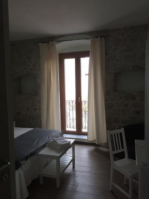 Desk, blackout drapes, soundproofing, iron/ironing board