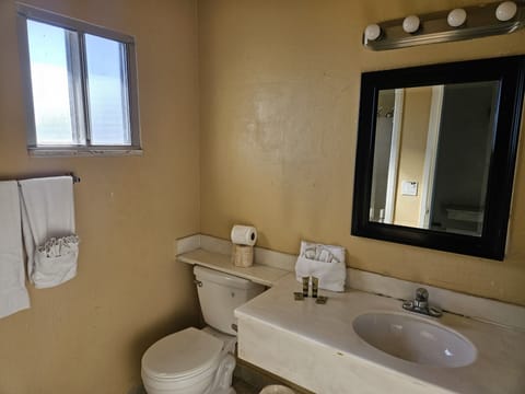 Standard Room, Multiple Beds, Non Smoking | Bathroom | Combined shower/tub, hair dryer, towels