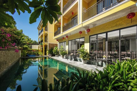 Outdoor pool, open 9:00 AM to 9 PM, pool umbrellas, sun loungers
