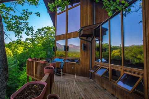 Huge windows and wrap around decks to capture the views