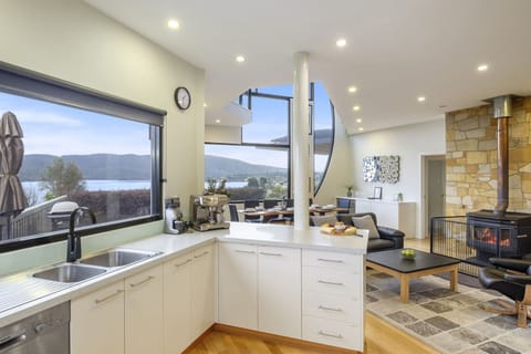 Large kitchen area equipped with a coffee maker, toaster, kettle etc.