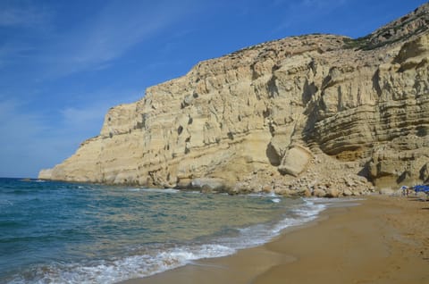 On the beach, sun loungers, beach towels