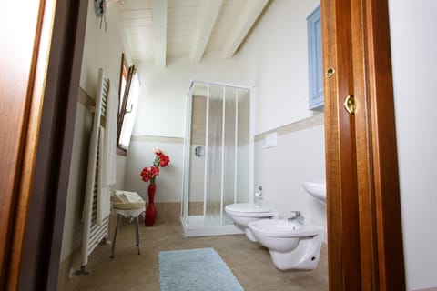 Superior Room | Bathroom | Shower, hair dryer, slippers, bidet