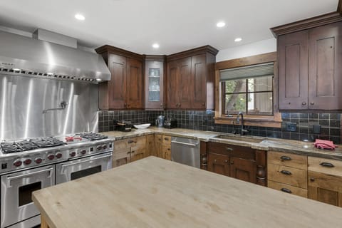 Viking stove + appliances, + about 20 different knives for your inner sous chef.