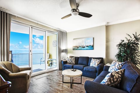 Living area looking out to balcony and ocean