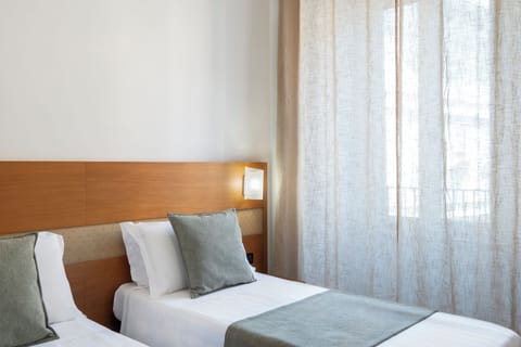Standard Double or Twin Room | Down comforters, minibar, in-room safe, desk