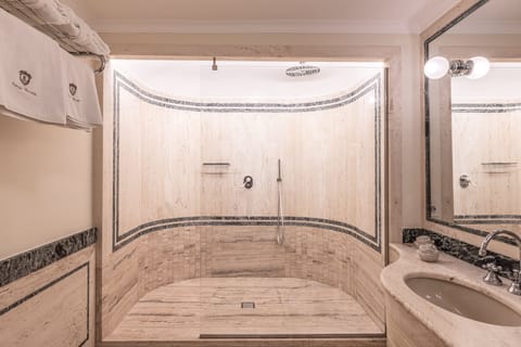 Junior Suite (French balcony) | Bathroom | Shower, free toiletries, hair dryer, slippers