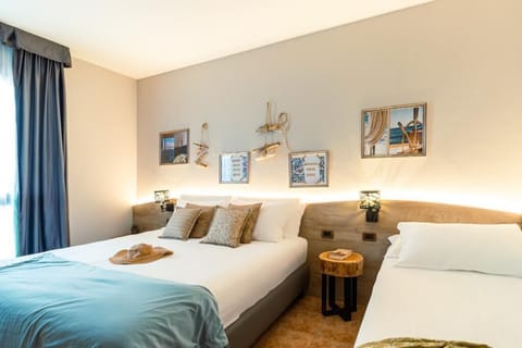 Family Double or Twin Room, 1 Bedroom | Premium bedding, down comforters, in-room safe, desk