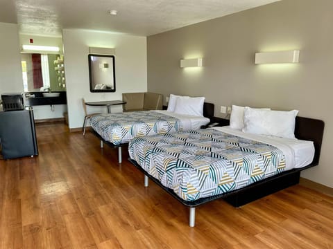 Blackout drapes, WiFi (free), bed sheets