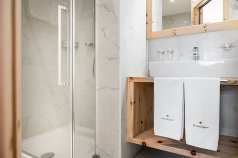 Comfort Room | Bathroom | Shower, designer toiletries, hair dryer, bathrobes