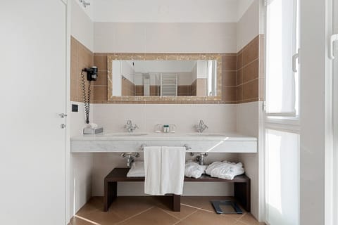 Shower, rainfall showerhead, eco-friendly toiletries, hair dryer