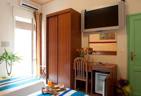 Triple Room | Frette Italian sheets, minibar, in-room safe, free WiFi