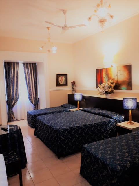 Quadruple Room | Desk, blackout drapes, soundproofing, cribs/infant beds
