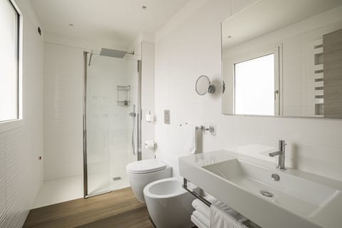 Rainfall showerhead, designer toiletries, hair dryer, bathrobes