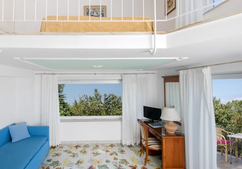 Junior Suite, Sea View | Minibar, in-room safe, desk, free WiFi