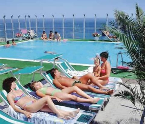 Seasonal outdoor pool, open 8:30 AM to 7:00 PM, sun loungers