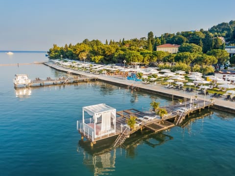 Private beach nearby, beach umbrellas, beach towels, beach massages