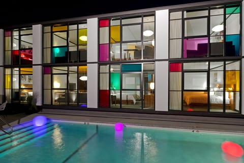 Outdoor pool, open 8:00 AM to 10:00 PM, pool umbrellas, sun loungers