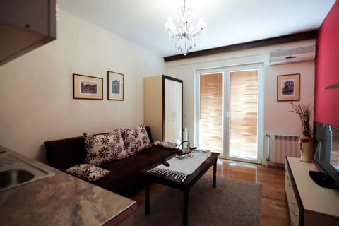 One Bedroom Apartment | Living room | Flat-screen TV